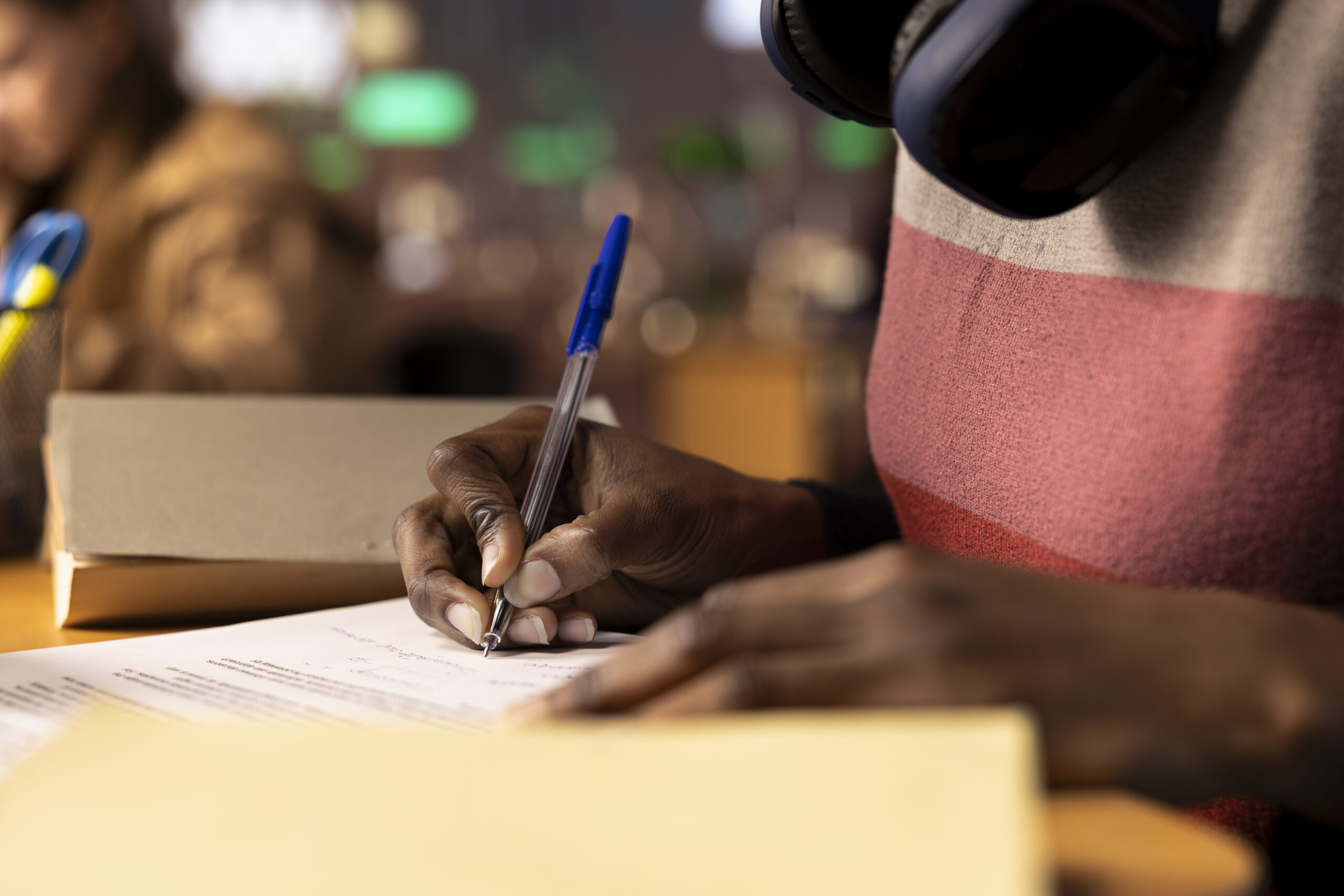 black university scholar completing course project using educational resources scaled 1